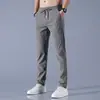 2026 Novas Calças Casuais Masculinas Slim Fit, Calças Longas Finas, Estilo Tendência Primavera e Outono, Calças Longas Masculinas Versáteis de Cor Sólida