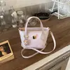 Bolso Cruzado de Hombro Casual de Nicho Nuevo Primavera 2026 para Mujer, Bolso Cubo Cruzado Dulce de Gran Capacidad Simple y Elegante