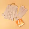 Ropa interior térmica de lyocell para otoño e invierno, capa base fina, camiseta de capa base, suave, amigable con la piel, sin costuras, cuello redondo, conjunto cálido para mujer