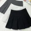 Saia Plissada Cinza Feminina Outono Inverno Cintura Alta Curta Design Moderno Emagrecedora Versátil Anti-exposição Saia Evasê Novo Estilo 2026