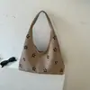 Bolsas de mano para mujer transfronterizas, nuevo bolso tote de gran capacidad para el otoño de 2026, bolso de mano y bolso de hombro de nicho de alta calidad para el día a día
