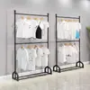 Perchero de ropa de hierro de doble varilla de pie de doble capa para exhibición en tienda de ropa, colgador de falda a cuadros JK para uso doméstico, simple, ajustable, económico