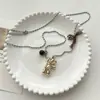 Tendencia de Moda Coreana y Japonesa Collar con Colgante de Oso de Piedra Natural y Circonita para Mujer 2025 Nuevo Otoño e Invierno Cadena Versátil para Suéter