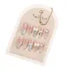 Set de 10 Piezas de Uñas Postizas Premium Hechas a Mano con un Look Sofisticado, Presentando Moños 3D, Cadenas de Pedrería y Diseño Ojo de Gato