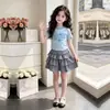 Moda Verano 2026 Top Casual de Manga Corta con Letras Falda de Tartán Dulce Personalidad Princesa Conjunto de Dos Piezas Moderno