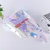 Suministro directo de fábrica bolsa de compras tote mágica de color láser transparente bolsa de compras tote mágica de color pvc bolsa de pvc bolsa de pedido