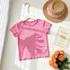 Popular Camiseta de Manga Corta de Seda Helada para Niñas 2026 Nuevo Estilo de Verano Estilo Dulce Dopamina Infantil Top Versátil Exportación