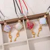 Nuevo collar con flor de ventana Ruyi de brocado estilo Song chino, colgante de tela de brocado de doble cara, accesorio de cuello vintage estilo chino, accesorio para llavero