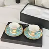 Taza de Café de Porcelana Fina Estilo Europeo con Fondo Verde y Diseño de Cabeza Humana, Adecuada para Uso en Casa, Té de la Tarde Británico, Cerámica Pintada en Oro, Juego de Caja de Regalo de Taza de Lujo Ligero