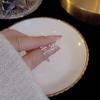 Pendientes asimétricos de estrella y luna para mujer, ligeros y lujosos, con incrustaciones de circonitas, pequeños y sencillos, con forma de lazo.