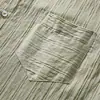 Camisa de manga corta con textura de rayas verticales para hombre, corte holgado, ambiente veraniego, marca de moda, color liso, camisa casual con cuello versátil