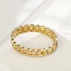 Pulsera de diamante hueco fina femenina moda personalidad cadena retorcida hebilla fábrica fuente venta al por mayor accesorios de aleación de zinc