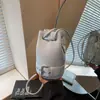 Bolso tipo cubo moderno y versátil para mujer 2025 Nuevo elegante y único Bolso de hombro cruzado Bolso pequeño de verano