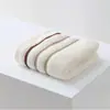 Atacado de fábrica toalha grossa toalha de rosto doméstica macia absorvente jacquard presente toalha de barraca fornecimento transfronteiriço