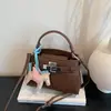 Bolso Coreano de Nicho para Mujer 2026 Nuevo Moda Transfronteriza Versátil para el Trabajo Hombro Cruzado Pequeño Cuadrado