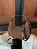 Bolso de luna de moda para mujer, bolso cruzado versátil vintage, bolso de mano ligero de nicho para ir al trabajo y uso diario