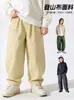 Nuevos pantalones deportivos de exterior para niños estilo coreano de otoño e invierno, duraderos y resistentes al agua, diseñados para niños mayores, pantalones para niños