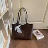 Bolsa tejida de gran capacidad, nuevo modelo 2026, bolso de hombro, elegante y único, adecuado para estudiantes universitarios para la clase y el transporte