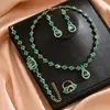 Moda Europea y Americana Verde Azul Rojo Pedrería Conjunto de Collar Pendientes Pulsera Anillo Amazon Estilo Caliente Cuatro Piezas Completamente de Diamante
