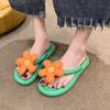 2023 Nuevas chanclas de fondo grueso con sensación de heces para mujer, verano, zapatillas de flores, clip para los pies, eva, venta al por mayor transfronteriza