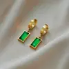 Pendientes de circón verde de alta calidad, pendientes anti-caída, estilo ins europeo y americano, pendientes de acero de titanio, pendientes de lujo ligero de nicho