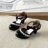 Zapatos de tacón alto de encaje estilo Lolita para niña 2026 Nuevo estilo Sandalias de tacón grueso con lazo y punta cerrada para niñas pequeñas