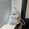 Bolsa dulce y texturizada para niña, nueva moda y estilo fresco 2026, mochila de viaje versátil, mochila casual estampada