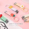 Cortauñas de Dibujos Animados Lindos para Estudiantes, Tijeras Mini Plegables para Uñas, Antisalpicaduras, Portátiles, Uso en Casa, Cortauñas de Manicura al por Mayor