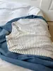 Camiseta Suelta de Manga Larga con Botones y Rayas Blancas para Otoño Temprano Estilo Casual Retro Perezoso Nuevo para Mujer 2026