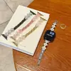 Pulseira de flor trevo de quatro folhas cravejada de diamantes com pulseira de metal adequada para Apple 11, Huawei 11, Fit5, GT5, Xiaomi 10