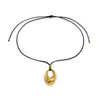 Dazan Joyería Transfronteriza Ins Europea y Americana Acero de Titanio Chapado en Oro de 18K Retro Commuter Oval Hueco Circonita Cordón de Cuero Negro Collar