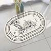 Estilo Pastoral Blanco y Negro Boceto Flor Ovalada Alfombrilla de Baño Lujo Ligero Balcón Dormitorio Imitación Cachemir Felpudo Stock Al Por Mayor