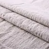 Algodón de cáñamo teñido tela jacquard grande vestido camisa tela a cuadros ropa china traje Tang cheongsam tela para ropa de hombre tela a rayas