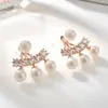 Corea nueva moda joyería para colgar en la oreja trasera pendientes redondos de perla y circón puesto de mayoreo productos nuevos