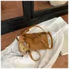 2026 Nuevo Bolso de Axila Esmerilado con Estampado de Leopardo para Mujer Bolso Retro de Nicho de un Solo Hombro Cruzado con Colgante Lindo Bolso Pequeño Versátil