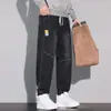 Jeans Cargo Masculino Novo para Primavera e Outono Marca da Moda Estiloso Largo Versátil Jogger Cordão Calças Harem Casuais Calças Longas