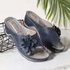 Pantuflas de talla grande transfronterizas para mujer 2021 nuevas de primavera y otoño sandalias casuales de cuña hueca flor de deseo zapatos de playa