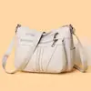 Bolsa feminina de couro macio multicamadas 2026 nova moda grande capacidade multi-compartimentos bolsa para mãe de meia-idade e idosa bolsa transversal casual