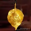[Desvanecimiento lento] Lujo ligero, versátil y de alta gama, colgante de Buda Maitreya en color dorado, un collar que encarna el concepto de iluminación a través de una sola hoja, exudando un aura moderna y elegante