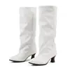 Estilo de comercio exterior 2026 otoño e invierno moda botas largas de tacón alto y punta fina con tacón de copa de vino, botas de montar altas de talla grande