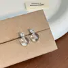 Brincos de agulha prateada com diamantes, argolas redondas transparentes, estilo coreano, adequados para o trabalho, estilosos, simples, de nicho, de alta qualidade, tarrachas elegantes