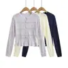 T378-26 Otoño estilo coreano ajuste ceñido cuello redondo manga larga jacquard calado de punto de un solo pecho chaqueta cárdigan