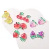 Pegatinas de frutas con gradiente de colores de lentejuelas transparentes accesorios pequeños accesorios de resina de flor pegamento de crema que brilla en la oscuridad al por mayor