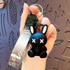 Llavero creativo y lindo con forma de ojo XX, pequeño y lindo conejo, con colgante de mochila escolar de dibujos animados para pareja, llavero de coche, pequeño regalo al por mayor