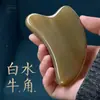 Venta al por mayor de fabricante tabla gua sha de cuerno de búfalo blanco, masajeador especial engrosado para la cara, gua sha de meridianos de la cabeza para salones de belleza