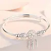 Versión coreana de la nueva pulsera de red de campanas atrapasueños, pulsera push-pull, viento frío, regalo 520, pulsera de plata con temperamento, venta al por mayor