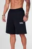 YOUNGLA Pantalones cortos estilo hoja seca americana para hombre, casual, camuflaje, verano, retro, con letras, holgados, para fitness, deportes, playa