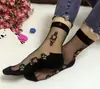 Medias de cristal al por mayor para niños rosa dulce antideslizantes con base de algodón transparentes de tubo medio para mujer calcetines de algodón de caña baja de moda