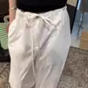 Calça Branca Minimalista Super Bonita de Cintura Alta em Tencel de Secagem Rápida para Mulheres 2026 Chegada Nova de Verão Cintura Botão Calças de Perna Larga Tendência