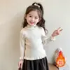 Suéter de Punto con Volantes en Orejas de Dibujos Animados de Cuello Alto Estilo Coreano para Niñas Otoño/Invierno 2026 Nueva Moda Infantil Prendas de Punto para Niñas Pequeñas